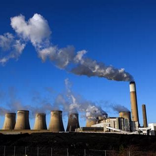 Power station chimneys with smoke
